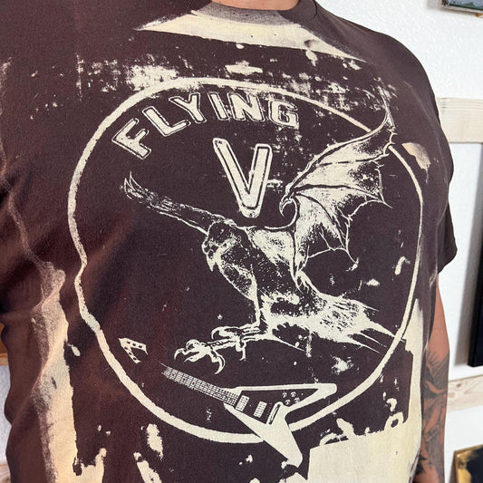 Model wearing rock band guitar tee – vintage distressed style