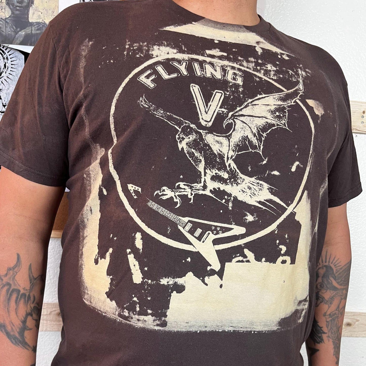 Side view of musician in Flying V tee – styled for stagewear